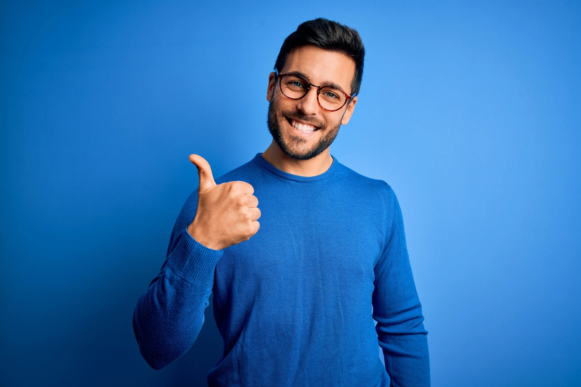 Close up photo of a person wearing blue